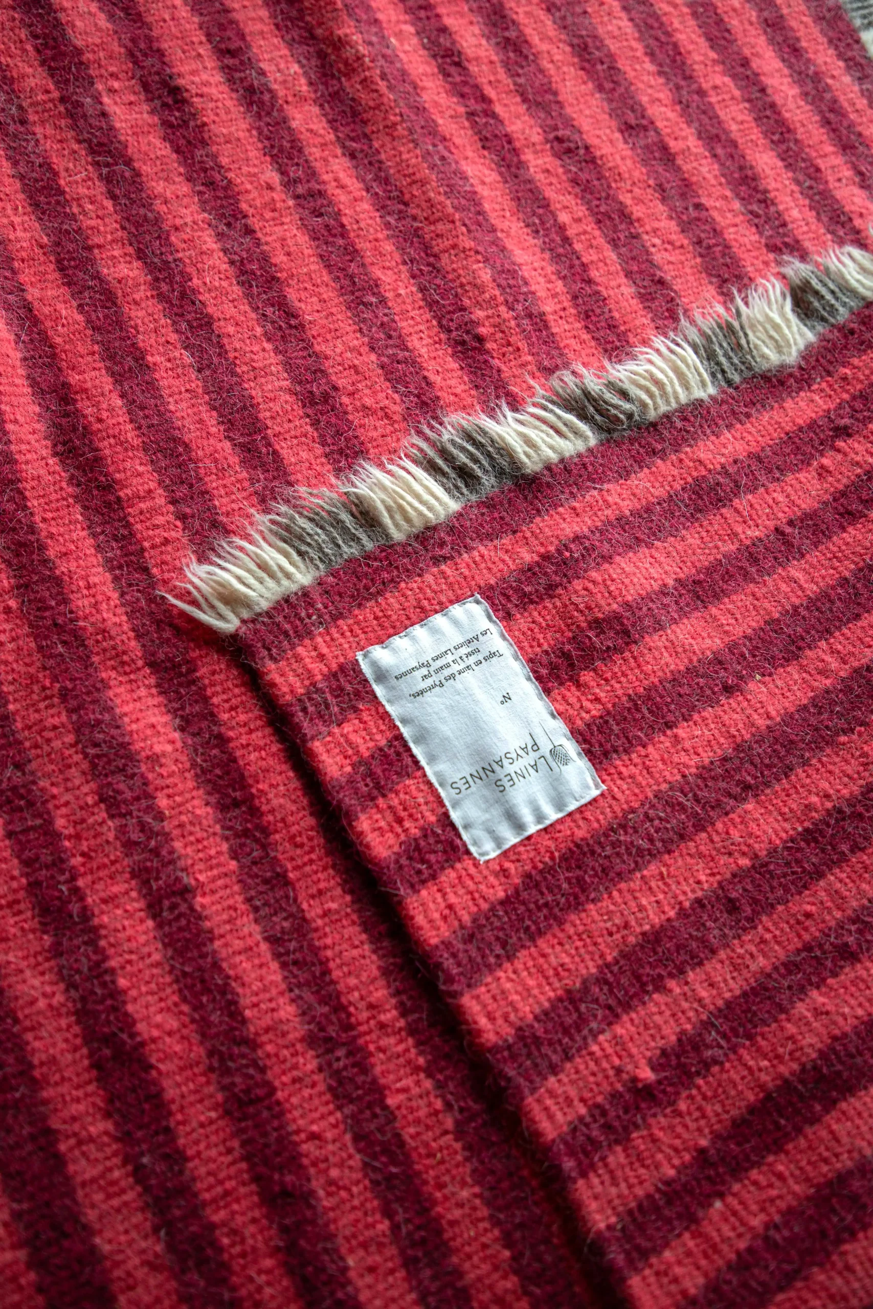 Tapis en laine rose